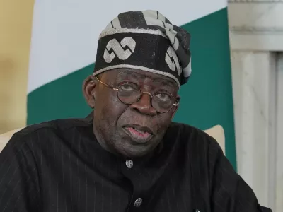 FILE -Nigerian President Bola Tinubu speaks to the media ahead of his meeting with Britain's Prime Minister Keir Starmer inside 10 Downing Street in London, Thursday, March 19, 2026. (AP Photo/Kin Cheung, Pool, File)