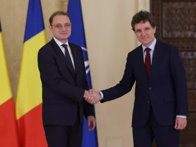 Romania's Prime Minister-designate Luca Niculescu shakes hands with Romanian President Nicusor Dan at Cotroceni Palace, in Bucharest, Romania, October 5, 2026. Inquam Photos/George Calin via REUTERS ATTENTION EDITORS - THIS IMAGE WAS PROVIDED BY A THIRD PARTY. ROMANIA OUT. NO COMMERCIAL OR EDITORIAL SALES IN ROMANIA