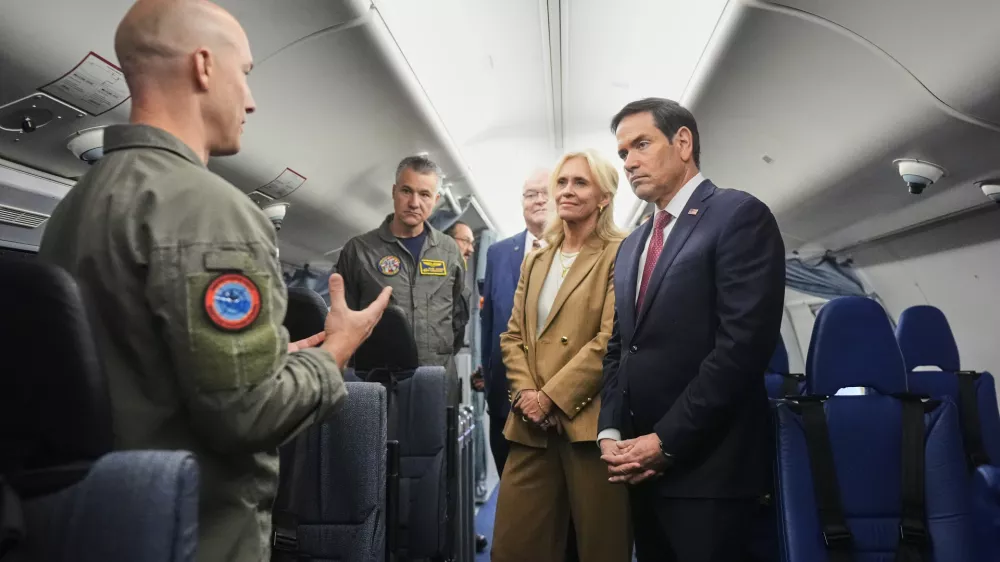U.S. Secretary of State Marco Rubio, right, and Iceland's Foreign Minister Thorgerour Katr&iacute;n Gunnarsdottir tour a U.S. Navy P-8 Poseidon aircraft,Tuesday, Oct. 6, 2026, at Keflavik Air Base, Iceland. (AP Photo/Mark Schiefelbein, Pool)