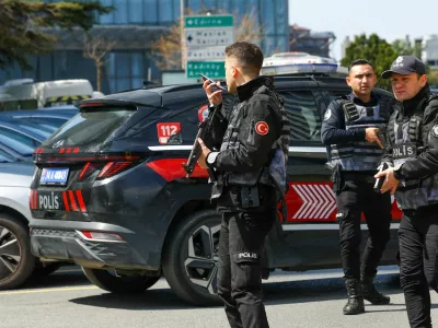 Police work at the scene, after gunfire was heard near the building housing the Israeli consulate, according to a witness, in Istanbul, Turkey, April 7, 2026. REUTERS/Murad Sezer