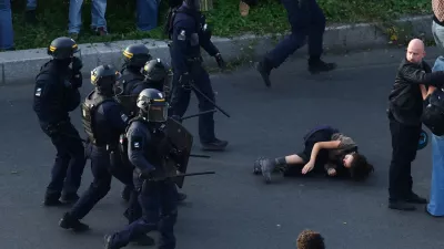 French CRS riot police charge protesters amid clashes at Place de la Nation during a demonstration by high school and university students, supported by teachers' union and school parents, in Paris as part of a nationwide day of demonstrations and blockades, voicing anger over overcrowded classrooms, teacher shortages and dilapidated school buildings, which students blame on years of underinvestment, France, October 6, 2026. REUTERS/Yves Herman   TPX IMAGES OF THE DAY