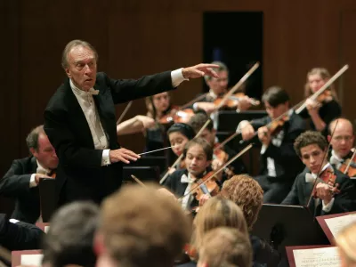 FILE - In this Aug. 10, 2007 filer, conductor Claudio Abbado, left, conducts his orchestra during the opening concert of the Lucerne Festival in Lucerne, Switzerland. Claudio Abbado, a star in the great generation of Italian conductors who was revered by musicians in the world's leading orchestras for developing a strong rapport with them while still allowing them their independence, has died Monday, Jan. 20, 2104. He was 80. Abbado made his debut in 1960 at La Scala in his home city of Milan and went on to be its musical director for nearly 20 years. Among his many other stints were as musical director of the Vienna State Opera, the Berlin Philharmonic and the London Symphony Orchestra and chief guest conductor of the Chicago Philharmonic. Even as he battled illness in his later years, Abbado founded his own all-star orchestra in Lucerne, Switzerland. (AP Photo/Eddy Risch, Keystone)