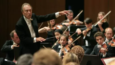 FILE - In this Aug. 10, 2007 filer, conductor Claudio Abbado, left, conducts his orchestra during the opening concert of the Lucerne Festival in Lucerne, Switzerland. Claudio Abbado, a star in the great generation of Italian conductors who was revered by musicians in the world's leading orchestras for developing a strong rapport with them while still allowing them their independence, has died Monday, Jan. 20, 2104. He was 80. Abbado made his debut in 1960 at La Scala in his home city of Milan and went on to be its musical director for nearly 20 years. Among his many other stints were as musical director of the Vienna State Opera, the Berlin Philharmonic and the London Symphony Orchestra and chief guest conductor of the Chicago Philharmonic. Even as he battled illness in his later years, Abbado founded his own all-star orchestra in Lucerne, Switzerland. (AP Photo/Eddy Risch, Keystone)