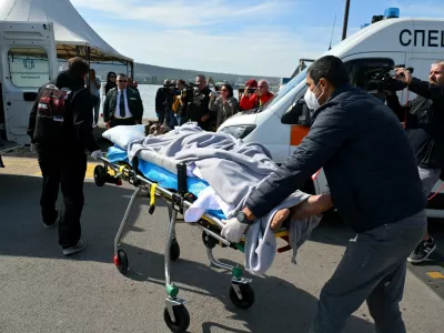 An injured crew member from a ship damaged in a drone attack is moved on a stretcher after being rescued after one vessel was sunk and another damaged in the Black Sea, in Varna, Bulgaria, October 6, 2026. REUTERS/Petko Momchilov   TPX IMAGES OF THE DAY