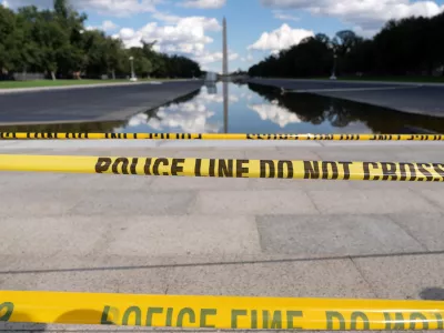 FILE - The Lincoln Memorial Reflecting Pool is seen with police line yellow tape at the National Mall, Sept. 6, 2026, in Washington. (AP Photo/Jose Luis Magana, File)
