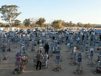 People visit the site of the Nova music festival, where partygoers were killed and kidnapped during the deadly Hamas-led October 7, 2023 attack, on the third anniversary of the attack, near Reim, southern Israel, October 7, 2026. REUTERS/Ronen Zvulun