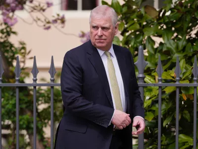 FILE - Britain's Andrew Mountbatten-Windsor, formerly known as Prince Andrew, looks round as he leaves after attending the Easter Matins Service at St. George's Chapel, Windsor Castle, England, April 20, 2025. (AP Photo/Kirsty Wigglesworth, File)