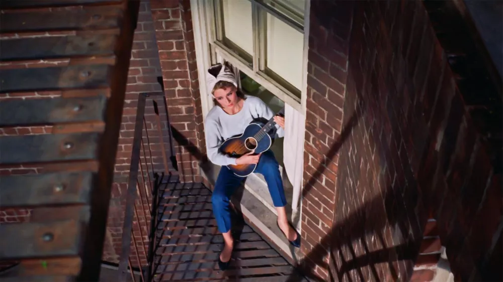 USA. Audrey Hepburn in a scene from the &Acirc;&copy;Paramount Pictures movie: Breakfast at Tiffany's (1961).Plot: A young New York socialite becomes interested in a young man who has moved into her apartment building, but her past threatens to get in the way.Ref: LMK110-J6745-180820Supplied by LMKMEDIA. Editorial Only.Landmark Media is not the copyright owner of these Film or TV stills but provides a service only for recognised Media outlets. pictures@lmkmedia.com,Image: 553719182, License: Rights-managed, Restrictions: Supplied by Landmark Media. Editorial Only. Landmark Media is not the copyright owner of these Film or TV stills but provides a service only for recognised Media outlets. Per la presente foto non Ă&uml; stata rilasciata liberatoria. Ai sensi di legge e come gi, Model Release: no 