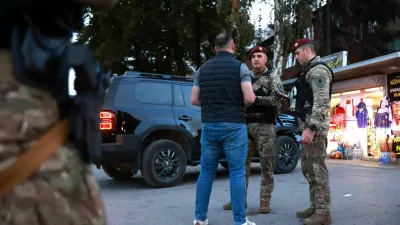 Members of the Special Police Unit of the Zenica-Doboj Canton Ministry of Interior (MUP ZDK) detained a drone operator after locating him using a counter-drone system while he was illegally flying a drone over the stadium ahead of the UEFA Nations League match between Bosnia and Poland in Zenica, Bosnia and Herzegovina, October 5, 2026. REUTERS/Dado Ruvic