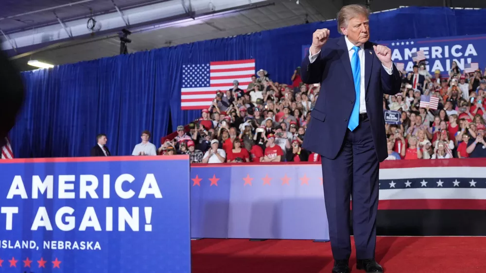 President Donald Trump dance at a campaign rally at the Pinnacle Bank Expo Center, Monday, Oct. 5, 2026, in Grand Island, Neb. (AP Photo/Alex Brandon)