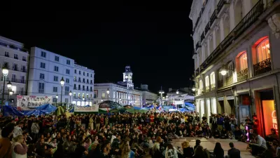People gather at the protest camp at Puerta del Sol square following the death of Maricarmen Abascal, the 87-year-old woman whose eviction sparked housing protests in Spain, in Madrid, Spain, October 7, 2026. REUTERS/Violeta Santos Moura