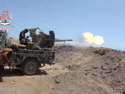 FILE PHOTO: A pro-Saudi-backed Yemeni government fighter fires a vehicle-mounted weapon during what government forces say was an advance against the Iran-backed Houthis, near Dhubab, Taiz Governorate, Yemen, in this still image taken from video released October 5, 2026.  Southern Giants Brigades/Handout via REUTERS  THIS IMAGE HAS BEEN SUPPLIED BY A THIRD PARTY. MUST NOT OBSCURE LOGO.  VERIFICATION: - Location partially verified from the runway, airport control tower, road layout, shape of the mountains and coastline, that matched topography mapping, satellite and archive imagery. - Date could not be independently verified. - No older versions found posted online before October 5./File Photo