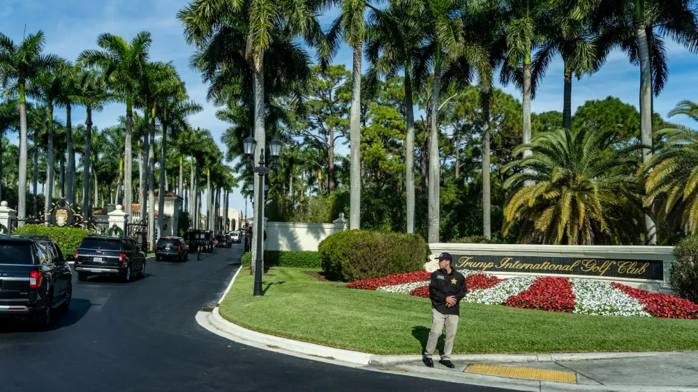 FILE - The motorcade for President Donald Trump arrives at Trump International Golf Club, Jan. 2, 2026, in West Palm Beach, Fla. (AP Photo/Alex Brandon, File)