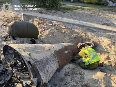 A police bomb squad member inspects an unexploded Russian missile warhead at a site of a Russian missile strike, amid Russia's attack on Ukraine, in Kyiv, Ukraine October 7, 2026. Press service of the National Police of Ukraine/Handout via REUTERS  THIS IMAGE HAS BEEN SUPPLIED BY A THIRD PARTY. DO NOT OBSCURE LOGO.