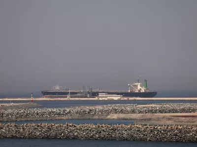 FILE PHOTO: A cargo ship docked at the Port of Fujairah, as the U.S.-Israel conflict with Iran limits marine traffic in the Strait of Hormuz, in Fujairah, United Arab Emirates, May 6, 2026. REUTERS/Amr Alfiky/File Photo