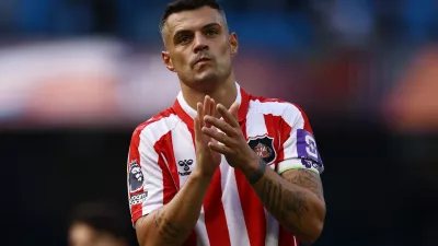Soccer Football - Premier League - Manchester City v Sunderland - Etihad Stadium, Manchester, Britain - September 20, 2026 Sunderland's Granit Xhaka applauds fans after the match Action Images via Reuters/Lee Smith EDITORIAL USE ONLY. NO USE WITH UNAUTHORIZED AUDIO, VIDEO, DATA, FIXTURE LISTS, CLUB/LEAGUE LOGOS OR 'LIVE' SERVICES. ONLINE IN-MATCH USE LIMITED TO 120 IMAGES, NO VIDEO EMULATION. NO USE IN BETTING, GAMES OR SINGLE CLUB/LEAGUE/PLAYER PUBLICATIONS. PLEASE CONTACT YOUR ACCOUNT REPRESENTATIVE FOR FURTHER DETAILS..