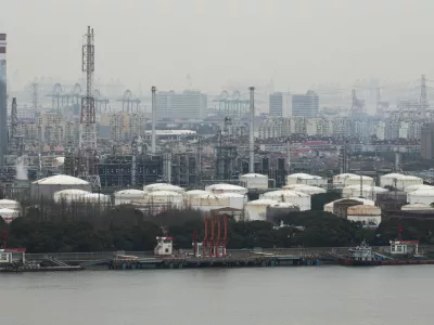 FILE PHOTO: Oil storage tanks and facilities of a Sinopec plant in Shanghai, China, March 26, 2026. REUTERS/Go Nakamura/File Photo