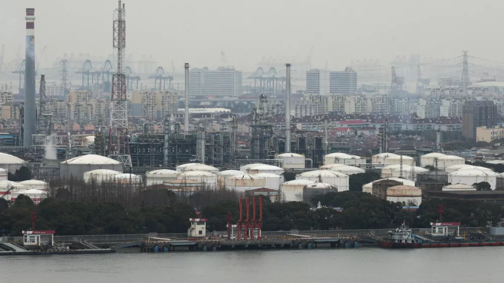 FILE PHOTO: Oil storage tanks and facilities of a Sinopec plant in Shanghai, China, March 26, 2026. REUTERS/Go Nakamura/File Photo