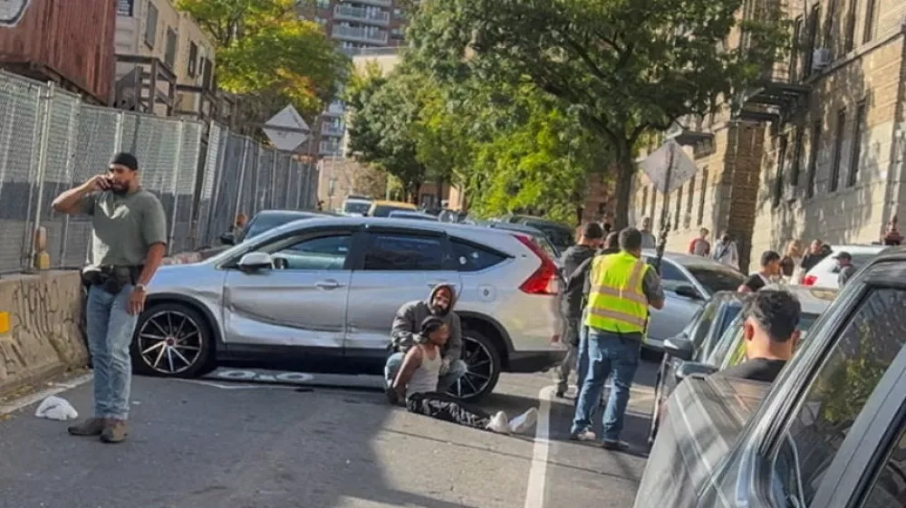 A man is detained after a shooting reportedly involving US Immigration and Customs Enforcement (ICE) officers in the Bronx borough of New York City, US, October 8, 2026, in this still image taken from video obtained from social media. Pedro Almarez/via REUTERS THIS IMAGE HAS BEEN SUPPLIED BY A THIRD PARTY. MANDATORY CREDIT. NO RESALES. NO ARCHIVES. THIS IMAGE WAS PROCESSED BY REUTERS TO ENHANCE QUALITY, AN UNPROCESSED VERSION HAS BEEN PROVIDED SEPARATELY. VERIFICATION Reuters verified the location from buildings, store front and road layout that matched archive imagery of the area. The date of the video was verified from original file metadata and New York Police Department reports of a shooting in the area on October 8.
