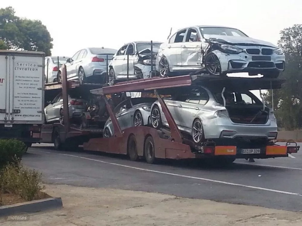 Na prikolici, ki je s prizori&scaron;ča snemanja avtomobile odpeljala nazaj v Nemčijo, je bilo sedem BMW-jev M3./ Foto: zajem zaslona / Foto: Zajem Zaslona