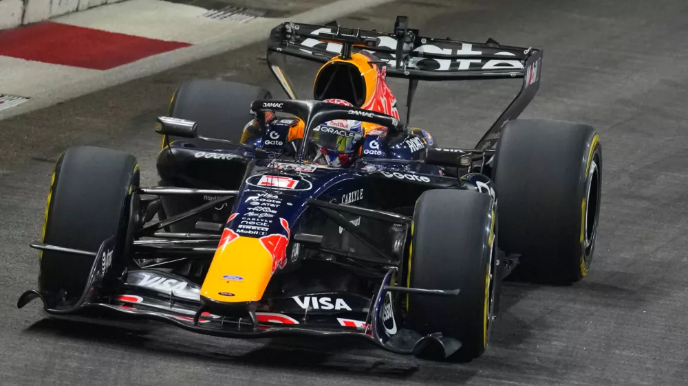 Red Bull driver Max Verstappen of the Netherlands steers his car during the sprint qualifying session ahead of the Singapore Formula One Grand Prix in Singapore, Friday, Oct. 9, 2026. (AP Photo/Vincent Thian)