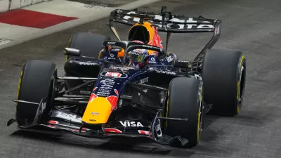 Red Bull driver Max Verstappen of the Netherlands steers his car during the sprint qualifying session ahead of the Singapore Formula One Grand Prix in Singapore, Friday, Oct. 9, 2026. (AP Photo/Vincent Thian)