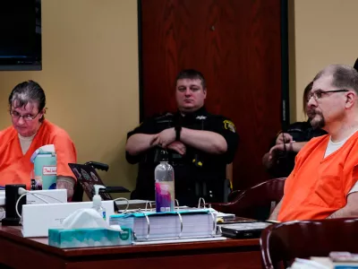 Cortney Bartholomew, left, sits at the defense table with her husband Bradley Bartholomew during a preliminary examination for them at the Wexford County Circuit Court House courtroom of 84rth District Judge Corey Wiggins on Friday, Sept. 18, 2026 as they are accused of killing Rebecca Park and her unborn baby.