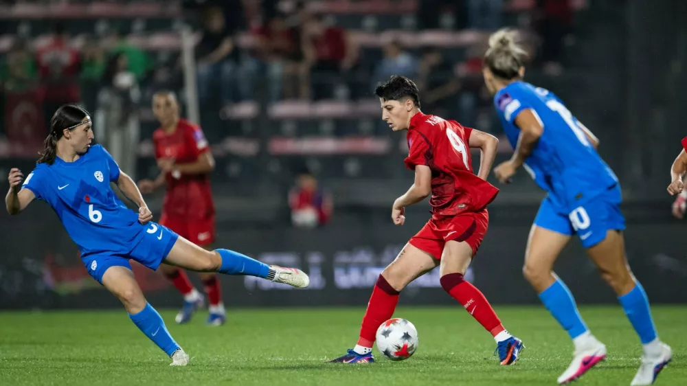 ISTANBUL, TURKIYE - OCTOBER 9: Kader Hancar (L) of Turkiye in action during the 2027 FIFA Women&acirc;&euro;&trade;s World Cup European qualifiers play-off first-leg match between Turkiye and Slovenia at Pendik Stadium in Istanbul, Turkiye, on October 9, 2026. Didem Mente / Anadolu,Image: 1141818345, License: Rights-managed, Restrictions:, Model Release: no 