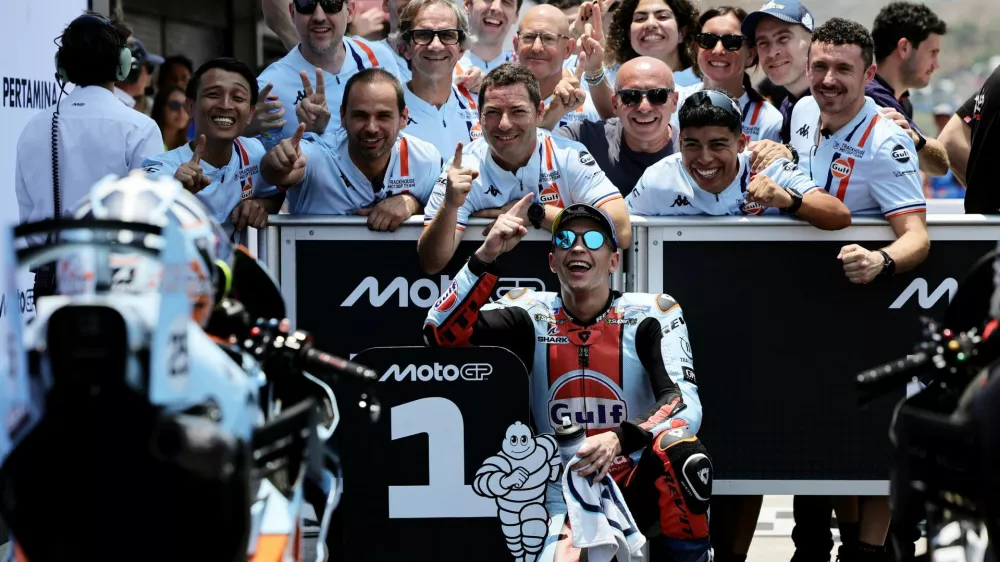 MotoGP - Indonesian Grand Prix - Mandalika International Street Circuit, Mandalika, Indonesia - October 10, 2026 Trackhouse MotoGP Team's Raul Fernandez celebrates with team members after qualifying in pole position REUTERS/Willy Kurniawan