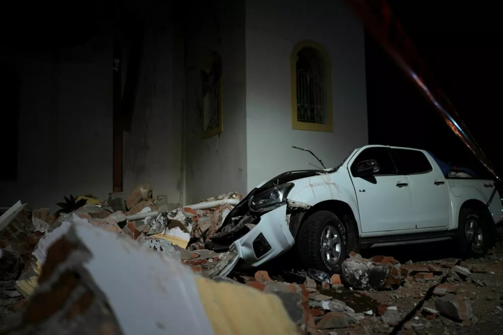 A car damaged by falling debris sits after an earthquake struck near the southern coast of Panama, in Penonome, Panama, October 9, 2026. REUTERS/Enea Lebrun