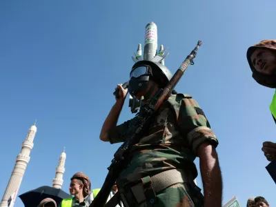 A Houthi supporter wearing a military uniform attends a rally to show support for the movement as fighting intensifies across several Yemeni fronts, in Sanaa, Yemen October 9, 2026. REUTERS/Mohammed al-Mahdi