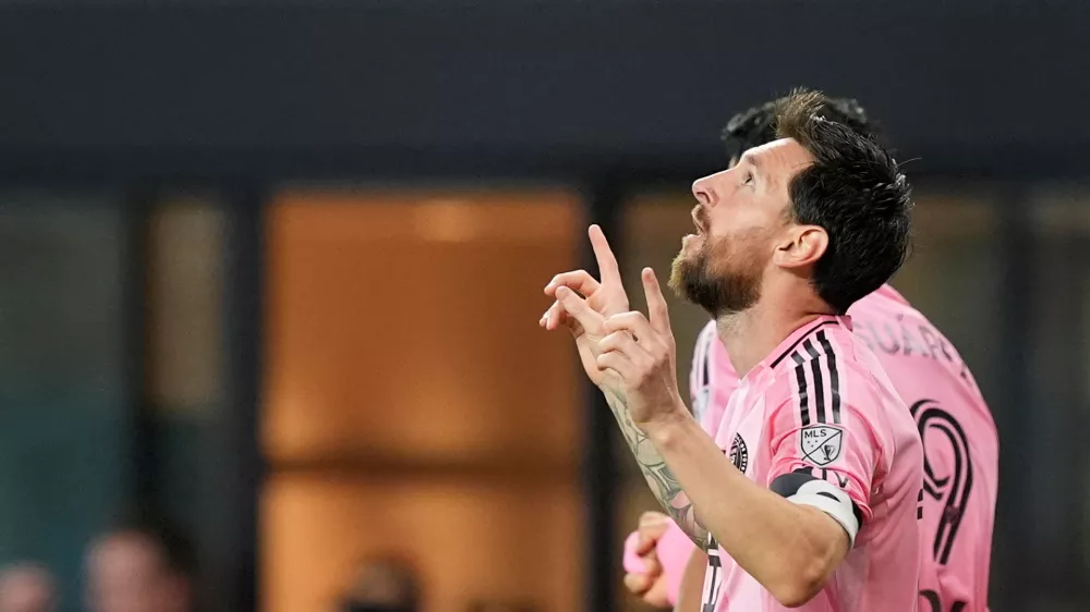 Inter Miami forward Lionel Messi reacts after scoring his side's third goal during the second half of an MLS soccer match against D.C. United, Saturday, Oct. 10, 2026, in Miami. (AP Photo/Rebecca Blackwell)