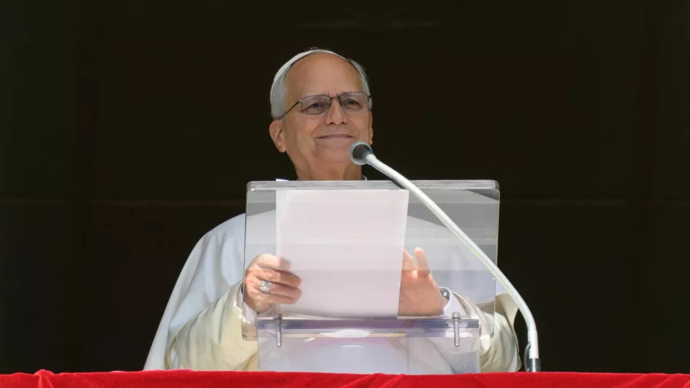 Pope Leo leads the Angelus prayer from the window of the Apostolic Palace at the Vatican, October 11, 2026. Vatican Media/Elisabetta Trevisan/&shy;Handout via REUTERS  ATTENTION EDITORS - THIS IMAGE WAS PROVIDED BY A THIRD PARTY.