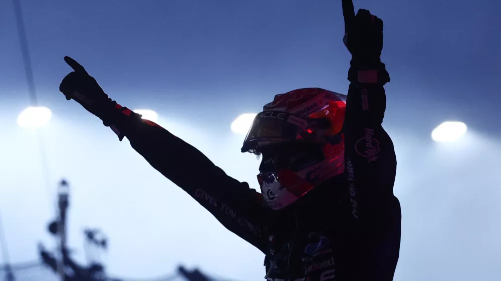 Formula One F1 - Singapore Grand Prix - Marina Bay Street Circuit, Singapore - October 11, 2026 Red Bull's Max Verstappen celebrates after winning the Singapore Grand Prix REUTERS/Jakub Porzycki