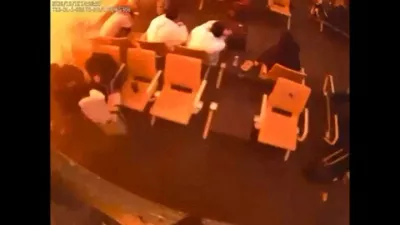 Surveillance footage shows people sitting in a waiting area reacting at the moment of an attack, in a location given as King Khalid International Airport in Riyadh, Saudi Arabia, October 10, 2026, in this frame from a handout video. Saudi Ministry of Media/Handout via REUTERS  THIS IMAGE HAS BEEN SUPPLIED BY A THIRD PARTY. OVERLAY FROM SOURCE. VERIFICATION: Reuters verified the location from the CCTV of the boarding gate from the infrastructure and furniture that matched the archive and satellite imagery from terminal 3 at King Khalid International Airport. The location of the CCTV that showed the people seated was not verified. The date the video was filmed was confirmed with the timestamp on the surveillance footage. The Saudi Civil Aviation Authority said the airport operations were suspended after an attack that left many injured on October 10. No old results were found posted online before October 11.