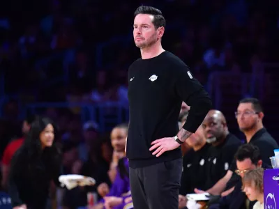 April 7, 2026; Los Angeles, California, USA; Los Angeles Lakers head coach JJ Redick watches game action against the Oklahoma City Thunder during the first half at Crypto.com Arena. Mandatory Credit: Gary A. Vasquez-Imagn Images