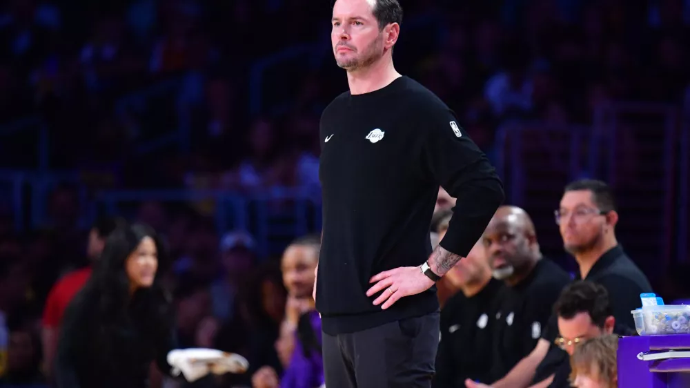 April 7, 2026; Los Angeles, California, USA; Los Angeles Lakers head coach JJ Redick watches game action against the Oklahoma City Thunder during the first half at Crypto.com Arena. Mandatory Credit: Gary A. Vasquez-Imagn Images