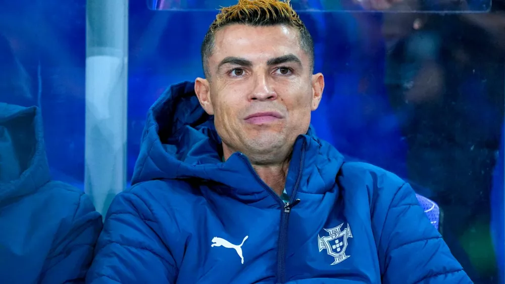 FILE PHOTO: Soccer Football - Nations League - Group A4 - Norway v Portugal - Ullevaal Stadion, Oslo, Norway - September 27, 2026 Portugal's Cristiano Ronaldo on the substitutes bench before the match Lise Aserud/NTB via REUTERS  ATTENTION EDITORS - THIS IMAGE WAS PROVIDED BY A THIRD PARTY. NORWAY OUT. NO COMMERCIAL OR EDITORIAL SALES IN NORWAY./File Photo