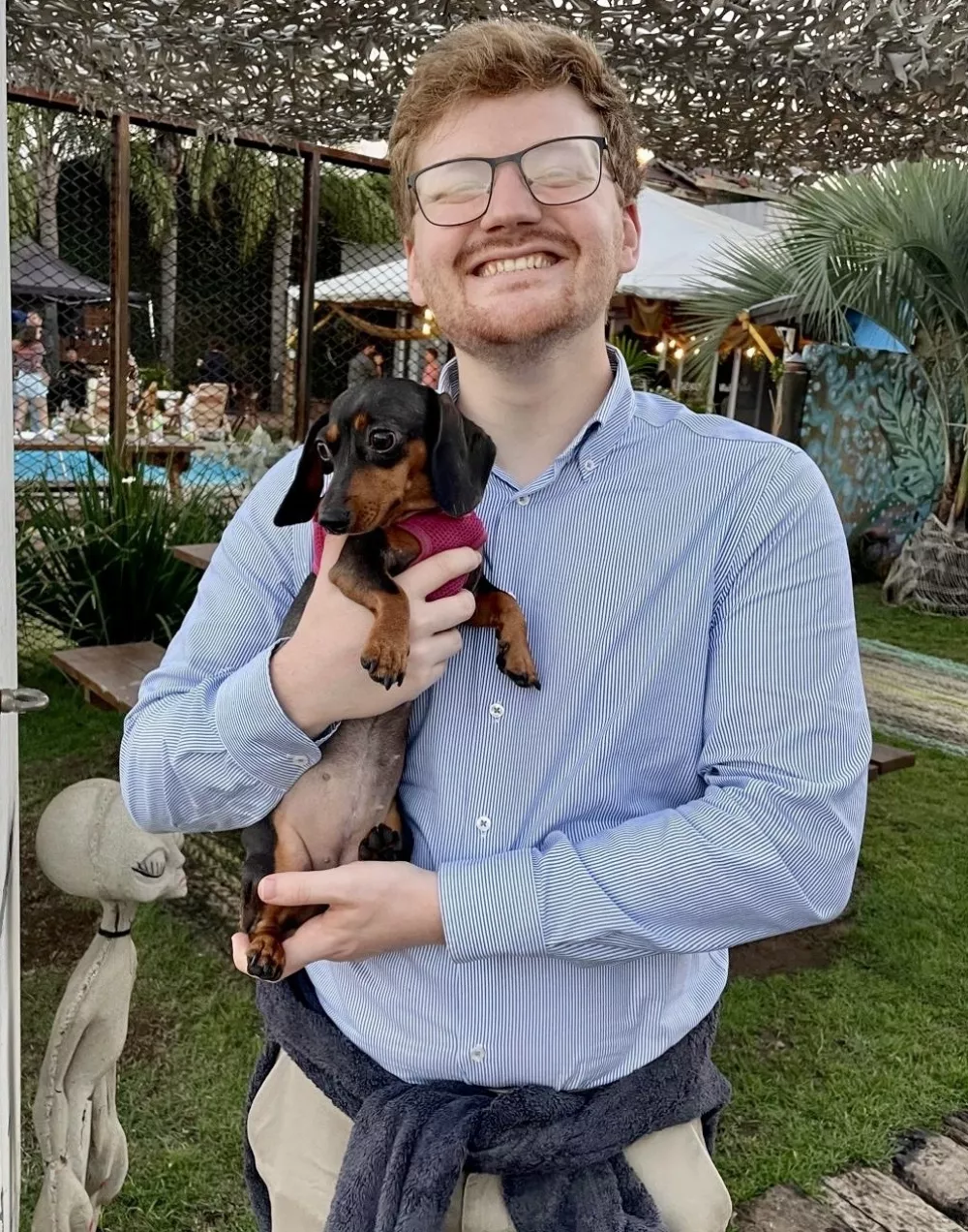 Story from Jam Press (House Sit Couple)Pictured: Connor dog-sitting for a friend in Brazil.'We cheat the hotel system by travelling the world while staying in strangers' luxury homes for FREE'A young couple cheat the hotel system by staying in strangers' luxury homes for free, helping them travel across the world together without blowing their budget.Ellen Carter, 26, and fianc&eacute; Connor Gill, 27, first tried house-sitting in early 2022 while they were still students and struggling to afford trips away.They have now stayed rent-free in 18 different countries, and plan to do two more before the year ends.Their first sit was hardly glamorous in distance, just ten minutes from Ellen's mum's home near Beaconsfield, Buckinghamshire.But the property itself was far from ordinary.The large Chilterns home near Gerrards Cross came with woodland, a cinema, a gym and three West Highland terriers to look after.At the time, Connor was completing the first year of his PhD while Ellen was finishing her Master's.The experience showed them they could slash one of the highest costs of travelling by swapping hotels for other people's homes.Just a few months later, in August 2022, they landed their first international pet-sit in Budapest, Hungary.Ellen had always wanted to visit the city but assumed they could only afford a rushed weekend.Instead, the couple spent ten days in a gated five-bedroom home with a huge garden and private swimming pool.The city centre was only a short bus journey away, while their location also offered quiet evenings, walking routes and little light pollution.Best of all, the accommodation cost them nothing."Budapest was probably the most luxurious house-sit we've done," Ellen told creatorzine.com."It had five bedrooms, a huge garden and a private swimming pool."We got really attached to the dog, Chilli, and we started getting into a rhythm of exploring somewhere new every day."It was probably the hardest one to leave."By cooking most of their meals at the house rather than eating out, Ellen says the entire ten-day trip &ndash; including flights and food &ndash; cost them just Ł200 each.It remains their cheapest holiday.The couple are also still in touch with the homeowners from both their Budapest and Gerrards Cross stays, turning what began as a money-saving arrangement into lasting connections.Since then, Ellen and Connor have travelled to 18 countries across three continents during their six-year relationship, mixing house-sits with more unusual travel experiences.One of their other standout stays was glamping in Morocco's Agafay Desert.Ellen said: "A close runner-up would be the glamping tent we stayed in in the Agafay Desert, Morocco."It was such a unique experience, with incredible stargazing and sunrises."Across their house-sits, the couple have clocked up more than 24 nights with no accommodation costs, including stays in Gerrards Cross, Budapest and Lymington.Ellen said the biggest advantage is the money saved, as well as being able to live more like locals.She said: "The biggest upside is the accommodation savings and access to a kitchen where we can cook for ourselves, rather than eating out at restaurants all the time."But the arrangement comes with responsibilities.Some pets require medication, while looking after somebody else's animal means they cannot simply disappear for entire days or stay out until the early hours.Ellen said: "It can be a lot of work if the pets require medication, which can be added responsibility and stress."Another downside is not being able to leave for huge periods of time."However, this suits our lifestyle as we don't drink or go out late very often, so this has never really bothered us."The pair use house-sitting platform HouseSit Match, which connects homeowners with travellers willing to care for their homes and pets in exchange for free accommodation.The couple are now living in Brazil for a year while Connor, a researcher, completes a work contract.Ellen, who previously worked as a caseworker for a Member of Parliament, has taken a career break.They are hoping Uruguay will become country number 19 in November, followed by Chile in December, where they plan to explore Patagonia before continuing to Santiago, Peru and the Amazon rainforest.ENDSEDITOR'S NOTE: Exclusive Licence: An exclusive licence has been obtained directly from the verified copyright holder. Jam Press holds exclusive distribution rights for the agreed content within the terms of the contributor agreement.,Image: 1141378346, License: Rights-managed, Restrictions: EDITOR'S NOTE: Exclusive Licence: An exclusive licence has been obtained directly from the verified copyright holder. Jam Press holds exclusive distribution rights for the agreed content within the terms of the contributor agreement., Model Release: no 