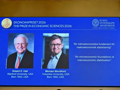 Images of Robert E. Hall and Michael Woodford are displayed as they are announced as the laureates of the 2026 Sveriges Riksbank Prize in Economic Sciences in Memory of Alfred Nobel at the Royal Swedish Academy of Sciences in Stockholm, Sweden, on October 12, 2026. TT News Agency/Anders Wiklund via REUTERS   ATTENTION EDITORS - THIS IMAGE WAS PROVIDED BY A THIRD PARTY. NO RESALES. NO ARCHIVES. SWEDEN OUT. NO COMMERCIAL OR EDITORIAL SALES IN SWEDEN.
