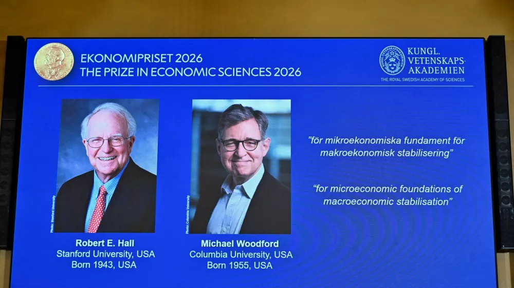 Images of Robert E. Hall and Michael Woodford are displayed as they are announced as the laureates of the 2026 Sveriges Riksbank Prize in Economic Sciences in Memory of Alfred Nobel at the Royal Swedish Academy of Sciences in Stockholm, Sweden, on October 12, 2026. TT News Agency/Anders Wiklund via REUTERS   ATTENTION EDITORS - THIS IMAGE WAS PROVIDED BY A THIRD PARTY. NO RESALES. NO ARCHIVES. SWEDEN OUT. NO COMMERCIAL OR EDITORIAL SALES IN SWEDEN.
