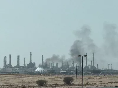 FILE PHOTO: Smoke rises from a fire at the Aramco refinery south of Riyadh, Saudi Arabia, October 3, 2026. Picture taken with a mobile phone. REUTERS/Stringer/File Photo