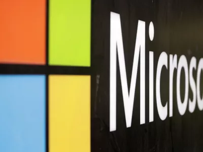 FILE - The Microsoft company logo is displayed at their offices in Sydney, Australia, on Wednesday, Feb. 3, 2021. Microsoft has closed on its approximately  billion acquisition of speech recognition company Nuance. The deal, which was announced last year, helps Microsoft Corp. get more entrenched into hospitals and the health care industry through Nuance&acirc;&euro;&trade;s widely used medical dictation and transcription tools. (AP Photo/Rick Rycroft, File)