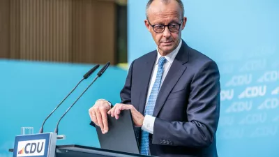 German Chancellor Friedrich Merz attends the press conference following the CDU Federal Executive Committee meeting and the special session of the party presidium, in Berlin Monday, Oct. 12, 2026. (Michael Kappeler/dpa via AP)