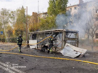 Firefighters work at the site of a Russian air strike, where a bus was hit, amid Russia's attack on Ukraine, in the city of Kramatorsk, in Donetsk region, Ukraine October 8, 2026. Press service of the State Emergency Service of Ukraine in Donetsk region/Handout via REUTERS ATTENTION EDITORS - THIS IMAGE HAS BEEN SUPPLIED BY A THIRD PARTY. DO NOT OBSCURE LOGO.