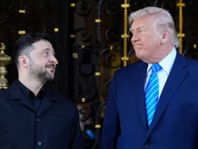 President Donald Trump greets Ukraine's President Volodymyr Zelenskyy at his Mar-a-Lago club, Sunday, Dec. 28, 2025, in Palm Beach, Fla. (AP Photo/Alex Brandon)