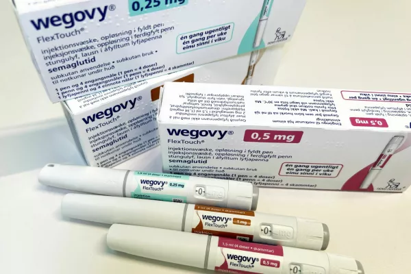 FILE PHOTO: Injection pens and boxes of Novo Nordisk's weight-loss drug Wegovy are shown in this photo illustration in Oslo, Norway, November 21, 2023. REUTERS/Victoria Klesty/Illustration/File Photo