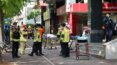 Firefighters and policemen gather outside the scene where several people were injured in a stabbing incident, in Incheon, South Korea, October 13, 2026.  Yonhap via REUTERS  THIS IMAGE HAS BEEN SUPPLIED BY A THIRD PARTY. NO RESALES. NO ARCHIVES. SOUTH KOREA OUT. NO COMMERCIAL OR EDITORIAL SALES IN SOUTH KOREA.