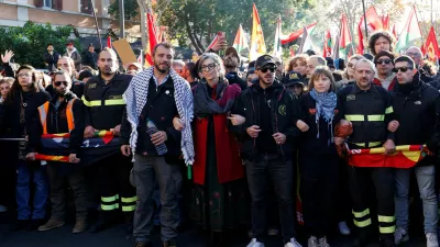 Francesca Albanese, the United Nations special rapporteur on the situation of human rights in the occupied Palestinian territory, and Swedish activist Greta Thunberg attend a demonstration during a nationwide strike, called by the USB union, in solidarity with Gaza and against the government and its plan to increase military spending, in Rome, Italy, November 29, 2025. REUTERS/Remo Casilli