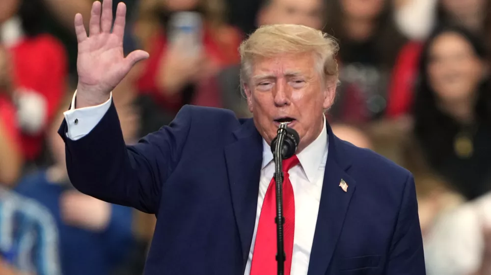 President Donald Trump speaks at a campaign rally at the Curtis D. Menard Memorial Sports Center, Tuesday, Oct. 13, 2026, in Wasilla, Alaska. (AP Photo/Lindsey Wasson)
